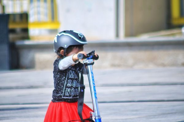 toddler-using-scooter-on-road-1642055